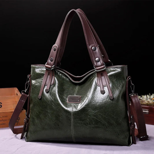 Augusta | Zachte leren tas met twee riemen en elegante details